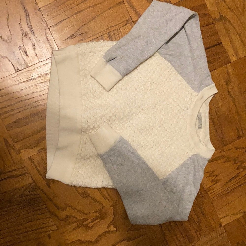 Kids white and grey sweater.